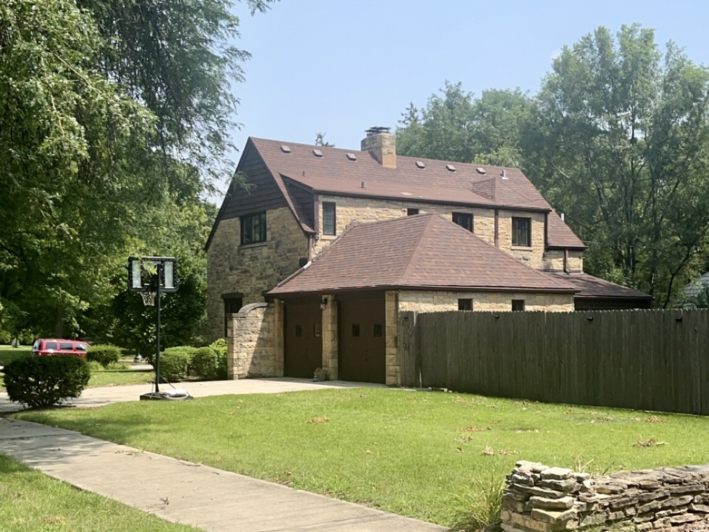 1010 Black Road Joliet, IL 60435 - Photo 3 of 17 a front view of a house with a garden