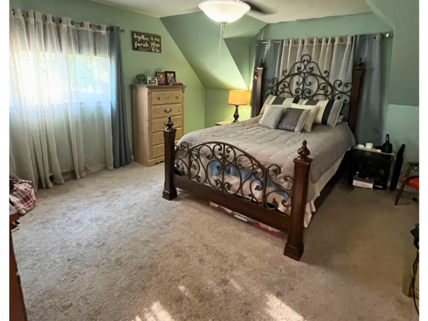 1010 Black Road Joliet, IL 60435 - Photo 10 of 17 a bedroom with a bed and a mirror