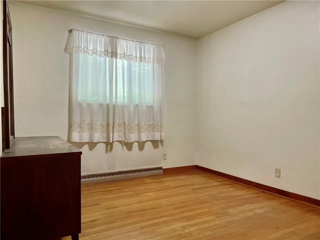 156 County Line Road Acme, PA 15610 - Photo 11 of 19 a view of an empty room with a window