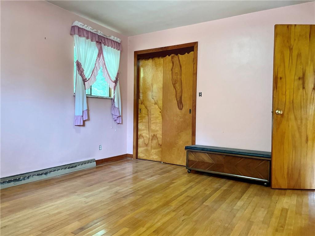 156 County Line Road Acme, PA 15610 - Photo 13 of 19 a view of room with window and wooden floor