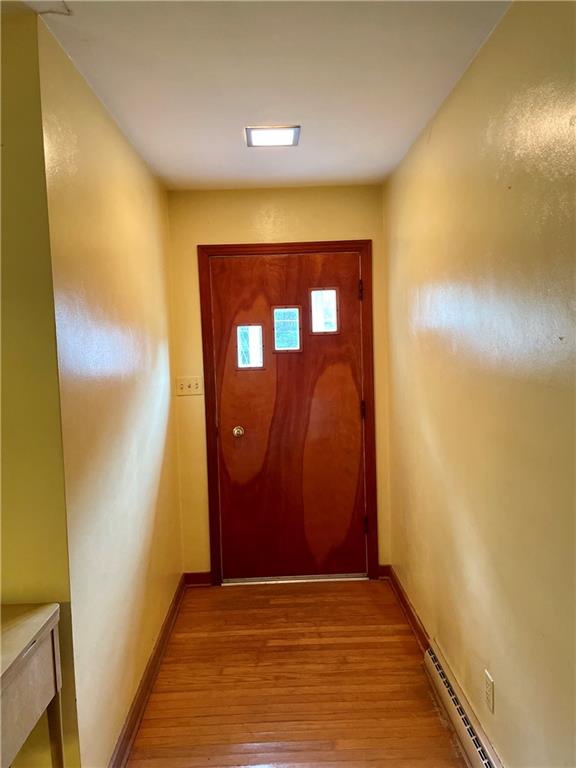 156 County Line Road Acme, PA 15610 - Photo 8 of 19 a view of a hallway with wooden floor