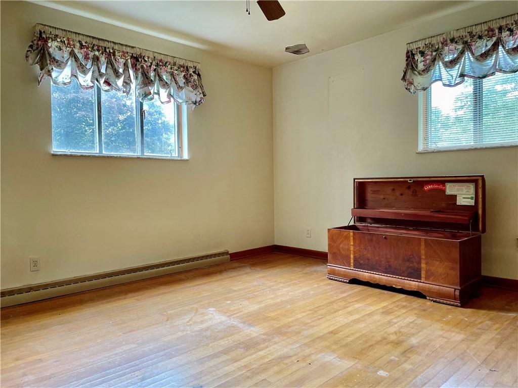 156 County Line Road Acme, PA 15610 - Photo 9 of 19 a room with furniture and a window