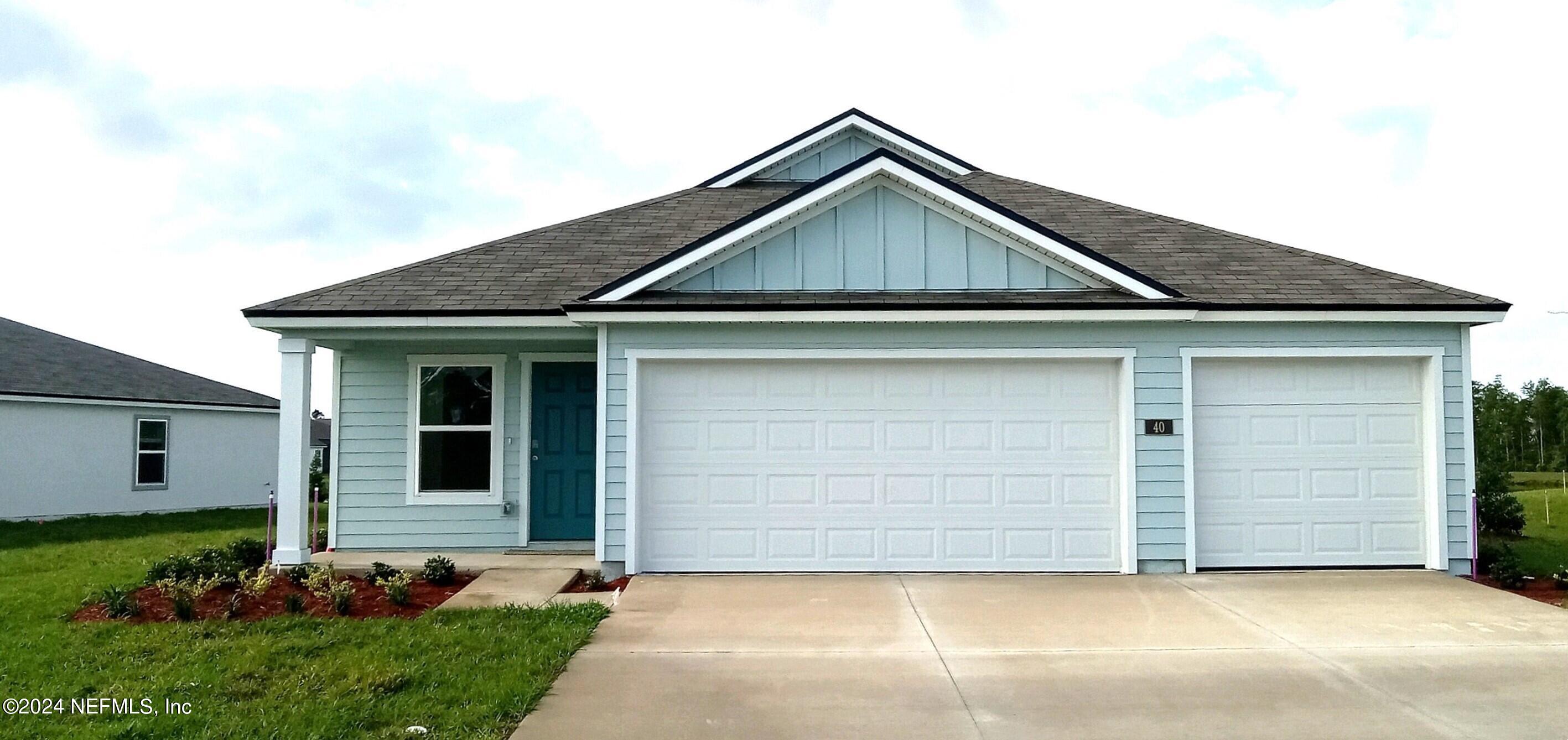 40 Hulett Wds Road Palm Coast, FL 32137 - Photo 1 of 25 Exterior lot 70
