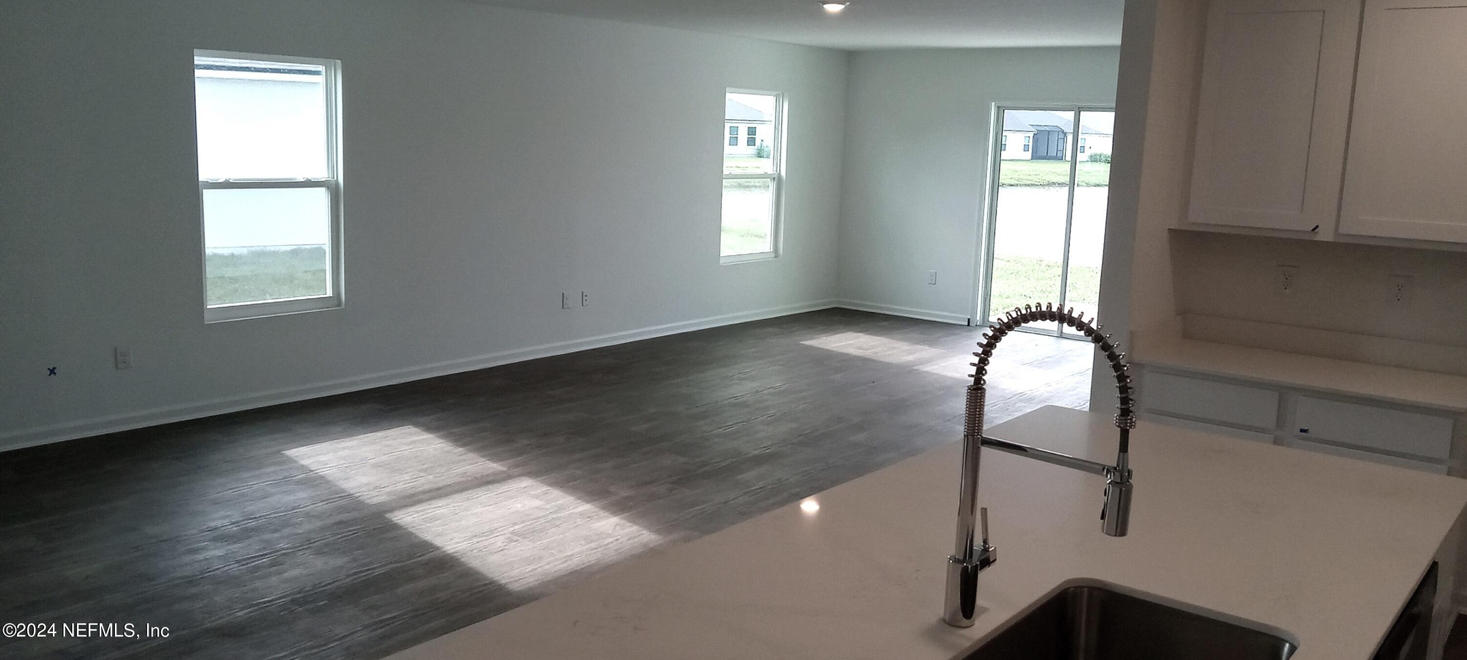 40 Hulett Wds Road Palm Coast, FL 32137 - Photo 5 of 25 looking out from the kitchen lot 70