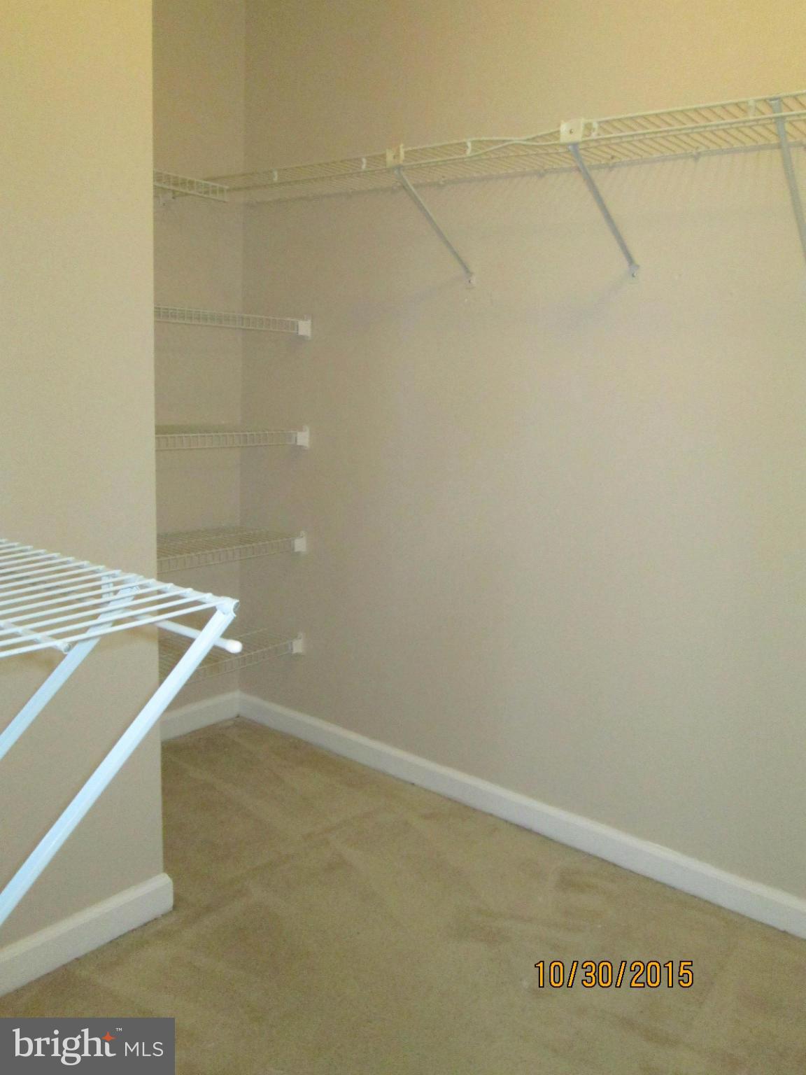 13706 Modrad Way, Unit 7A41 Silver Spring, MD 20904 - Photo 9 of 15 Walk in closet in master bedroom