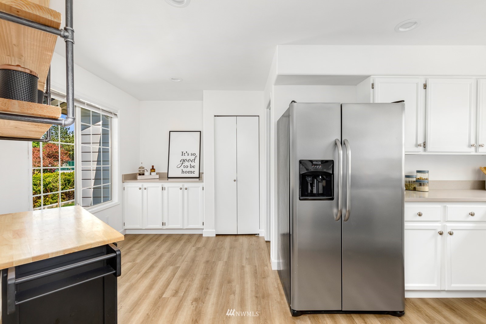 901 South 32nd Street Renton, WA 98055 - Photo 11 of 32 a kitchen with stainless steel appliances a refrigerator and a stove