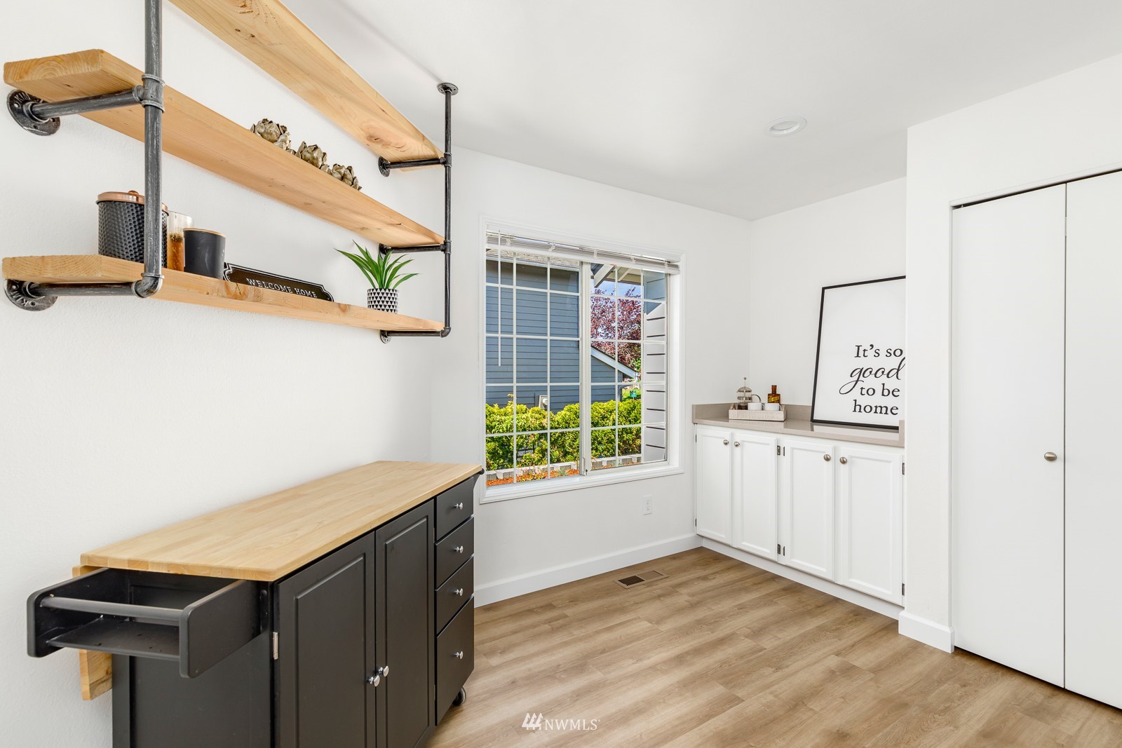 901 South 32nd Street Renton, WA 98055 - Photo 12 of 32 a kitchen with a sink cabinets and wooden floor