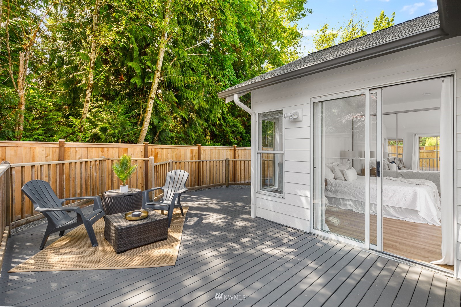 901 South 32nd Street Renton, WA 98055 - Photo 25 of 32 a outdoor view with a sitting space and large trees