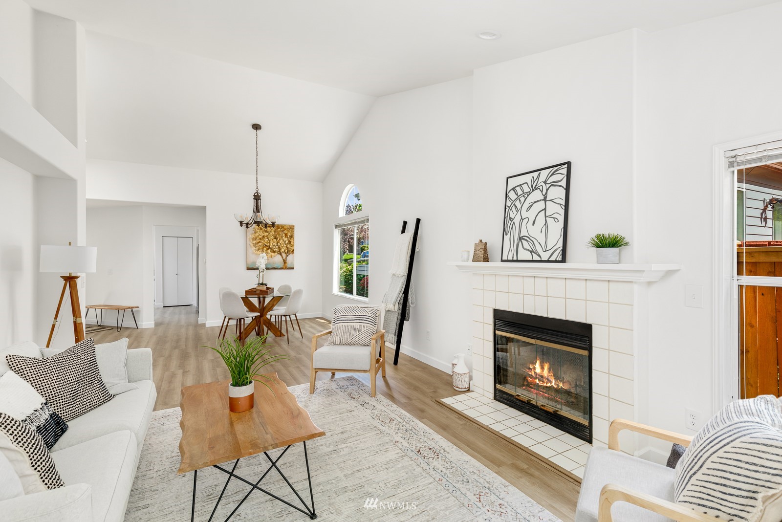 901 South 32nd Street Renton, WA 98055 - Photo 9 of 32 a living room with furniture and a fireplace