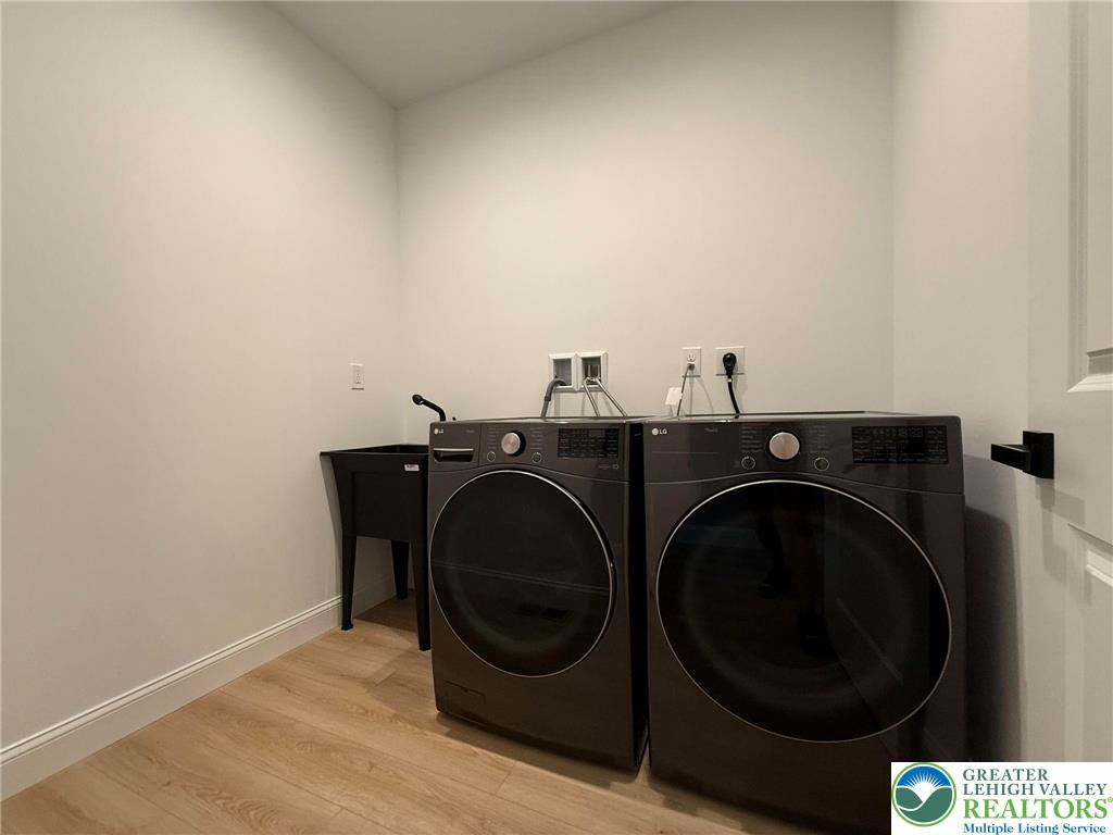Strauss Lane, Unit 1 Bethlehem, PA 18015 - Photo 11 of 56 a utility room with dryer and washer