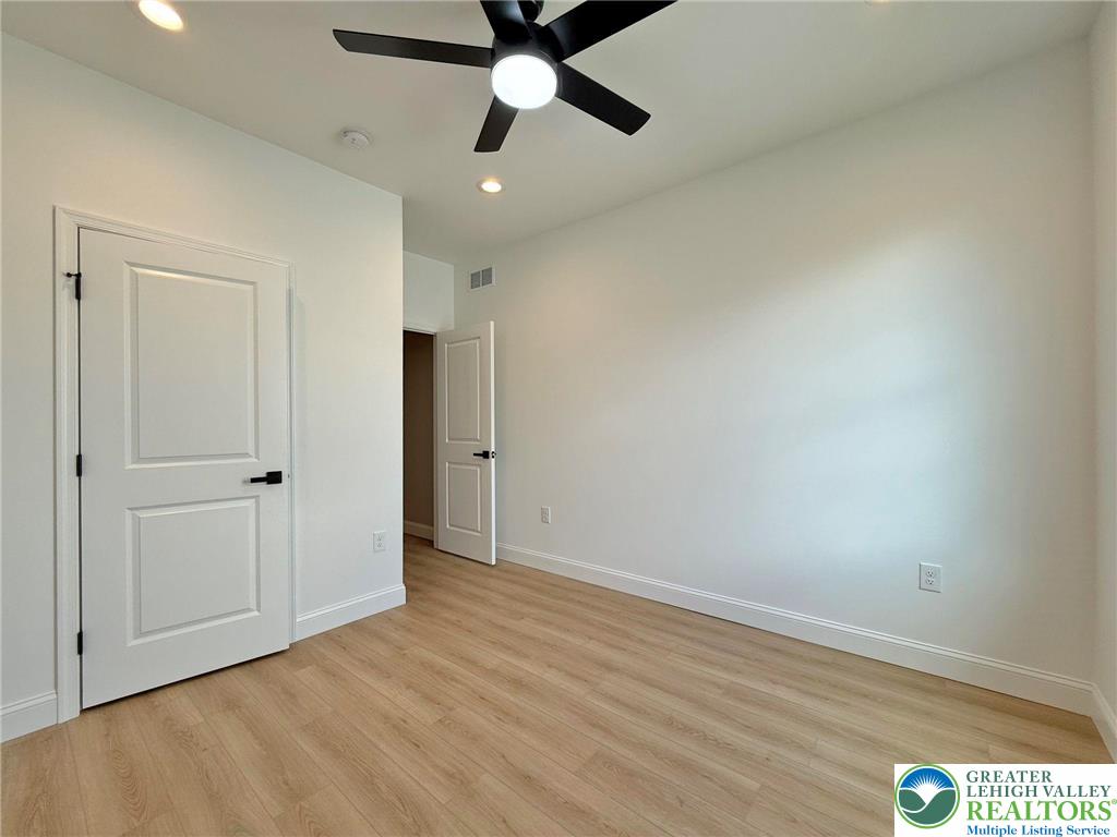 Strauss Lane, Unit 1 Bethlehem, PA 18015 - Photo 17 of 56 wooden floor in an empty room