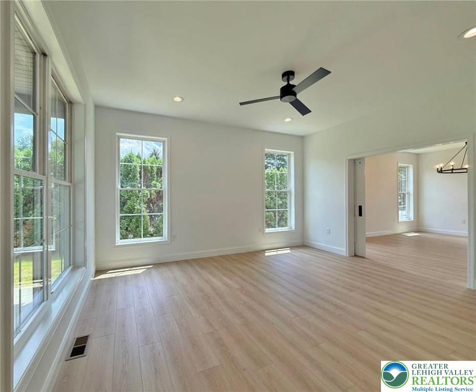Strauss Lane, Unit 1 Bethlehem, PA 18015 - Photo 21 of 56 wooden floor in an empty room with a window