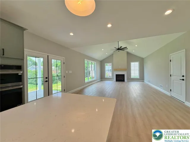 a view of a hallway with windows