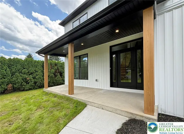 a view of a backyard of the house