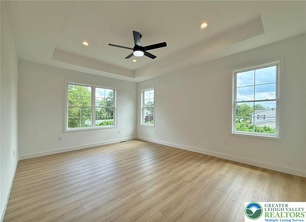 Strauss Lane, Unit 1 Bethlehem, PA 18015 - Photo 43 of 56 a view of empty room with wooden floor and fan