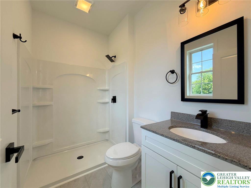 Strauss Lane, Unit 1 Bethlehem, PA 18015 - Photo 56 of 56 a bathroom with a sink toilet and shower