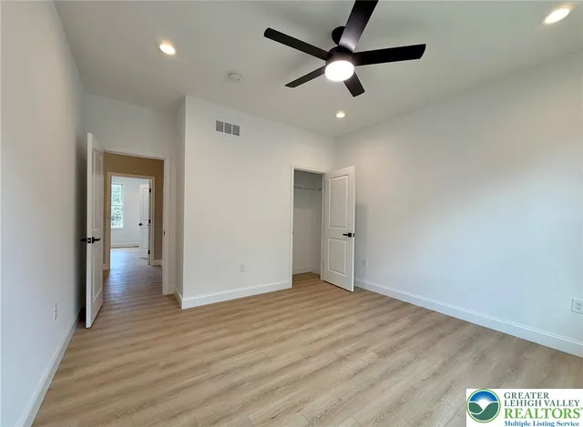 a utility room with sink dryer and washer