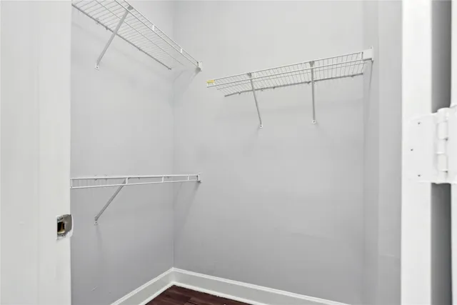 a view of a room with racks on the wall