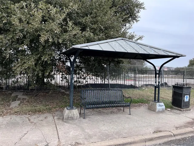 a view of a wrought iron fences in front of house