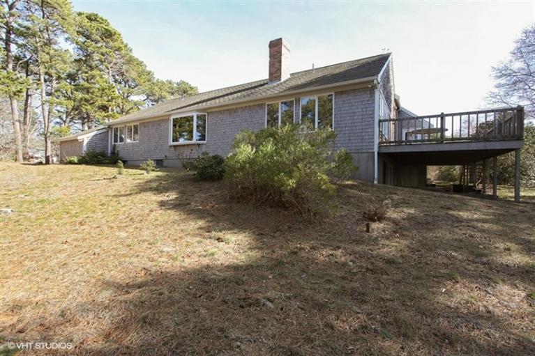 1020 Samoset Road Eastham, MA 02642 - Photo 13 of 16 a view of a house with a yard