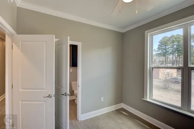 wooden floor and windows in an empty room