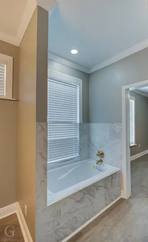 a bathroom with a bathtub