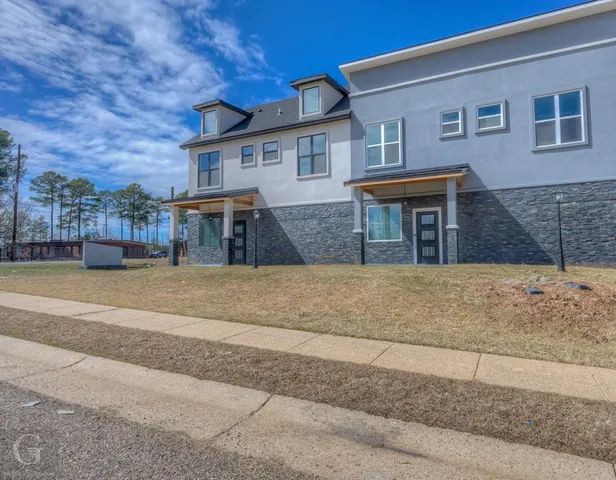 a view of a house with a outdoor space