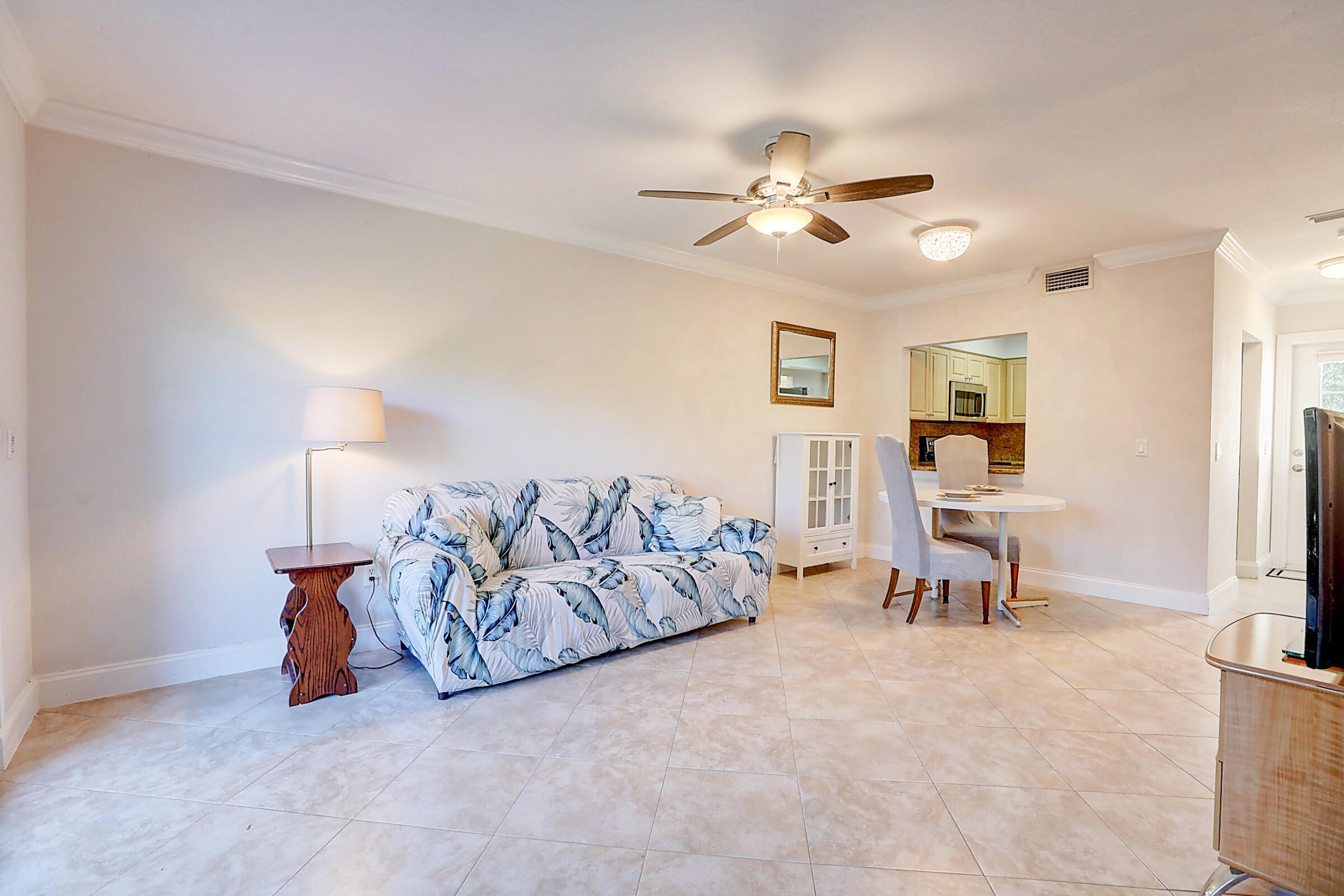 3129 Southeast Indian Street, Unit 3 Stuart, FL 34997 - Photo 16 of 32 Living Area with Dinette