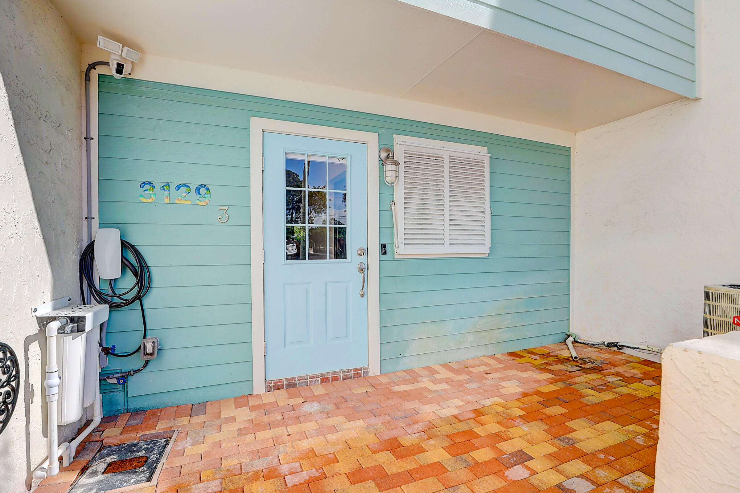 3129 Southeast Indian Street, Unit 3 Stuart, FL 34997 - Photo 3 of 32 Front Door 1