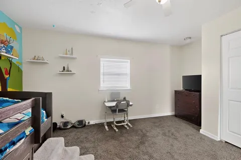 a room with window dryer and washer