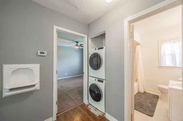 a view of storage and utility room with washer and dryer