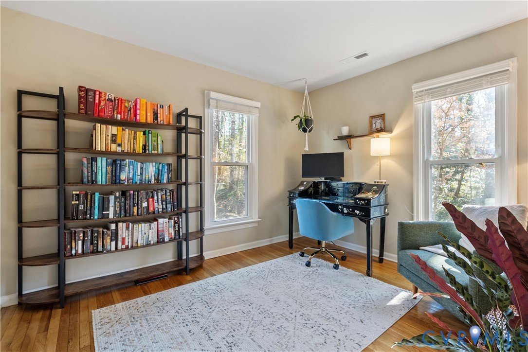 13207 Court Ridge Road Midlothian, VA 23112 - Photo 23 of 36 a work room with furniture book shelf and a window