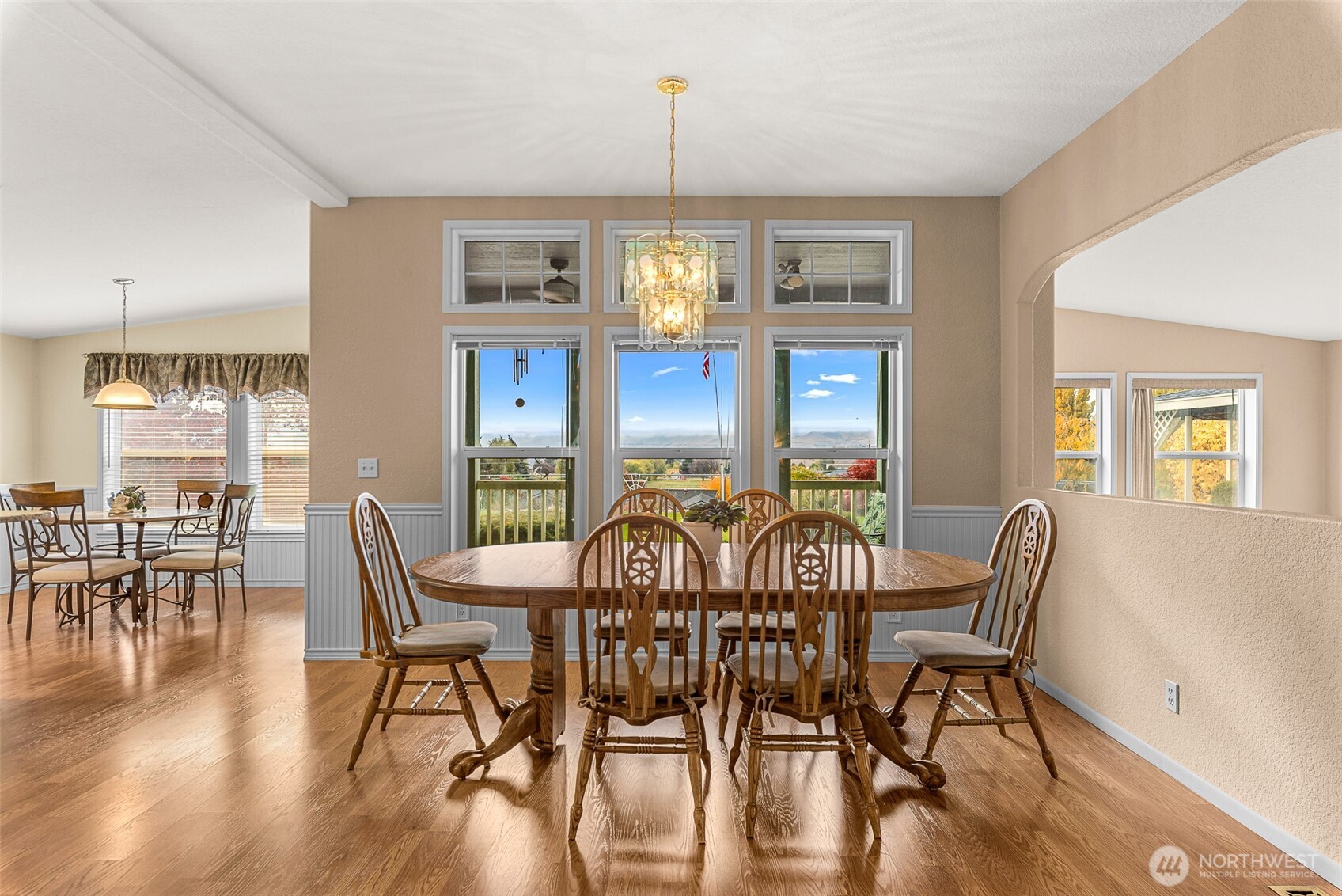 420 Sunnyslope Heights Road Wenatchee, WA 98801 - Photo 12 of 40 a view of a dining room with furniture window and wooden floor