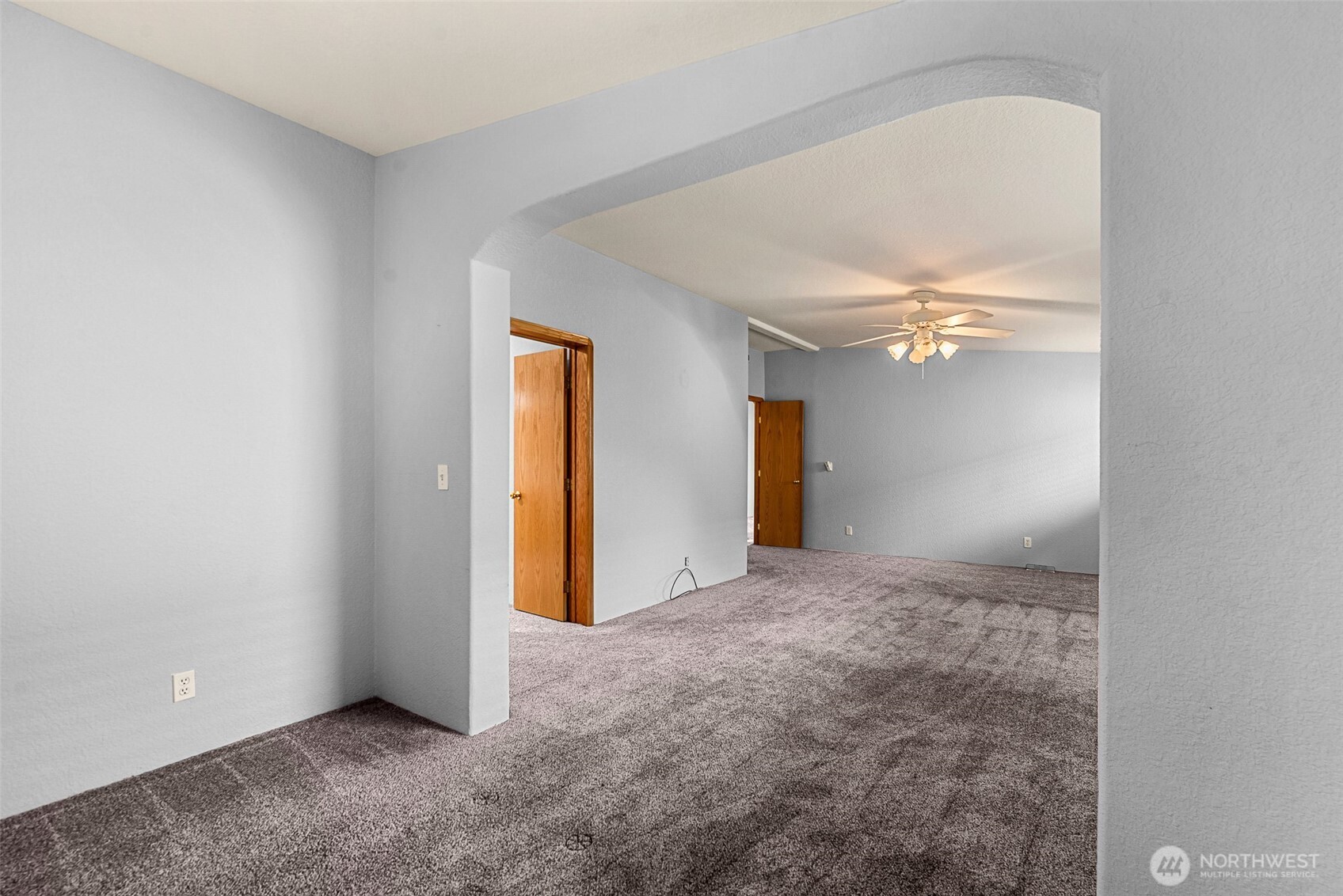 420 Sunnyslope Heights Road Wenatchee, WA 98801 - Photo 24 of 40 a view of a big room with chandelier fan