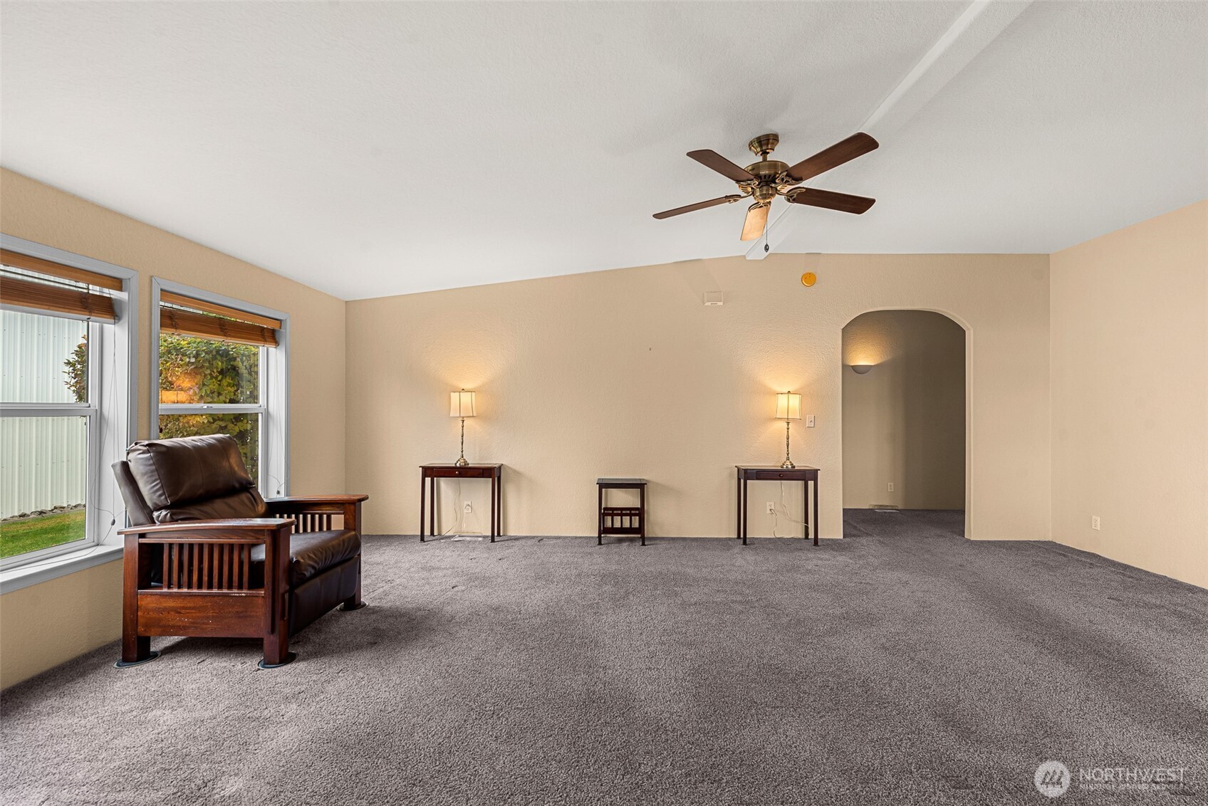 420 Sunnyslope Heights Road Wenatchee, WA 98801 - Photo 9 of 40 a living room with furniture and a chandelier