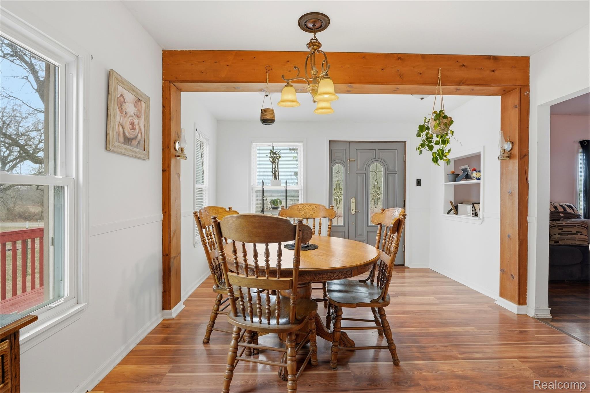 8732 Kinch Road Jackson, MI 49201 - Photo 11 of 39 Dining area with wood finished floors and baseboards