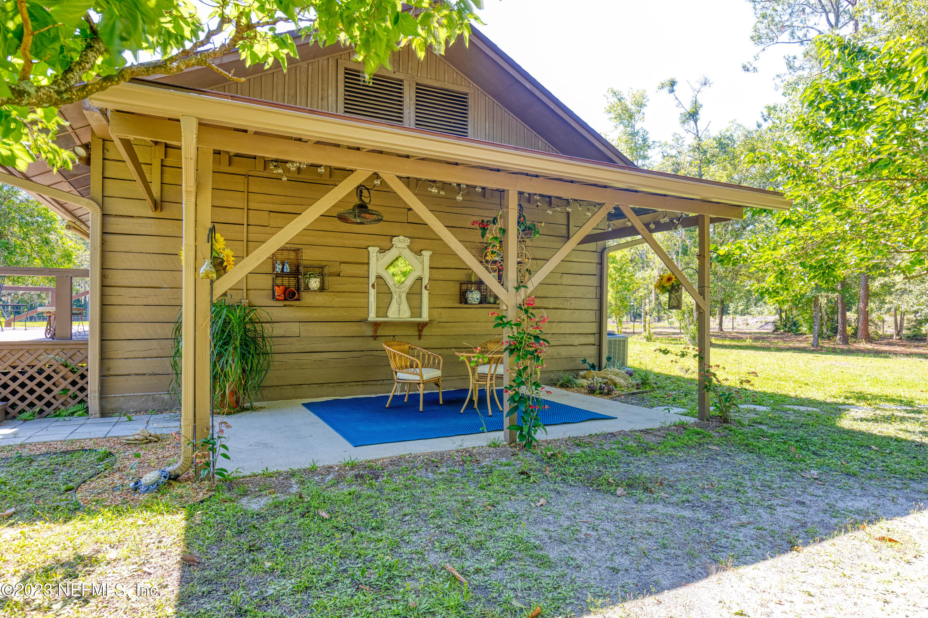3075 Joe Ashton Road St. Augustine, FL 32092 - Photo 26 of 50 Covered patio on the other side