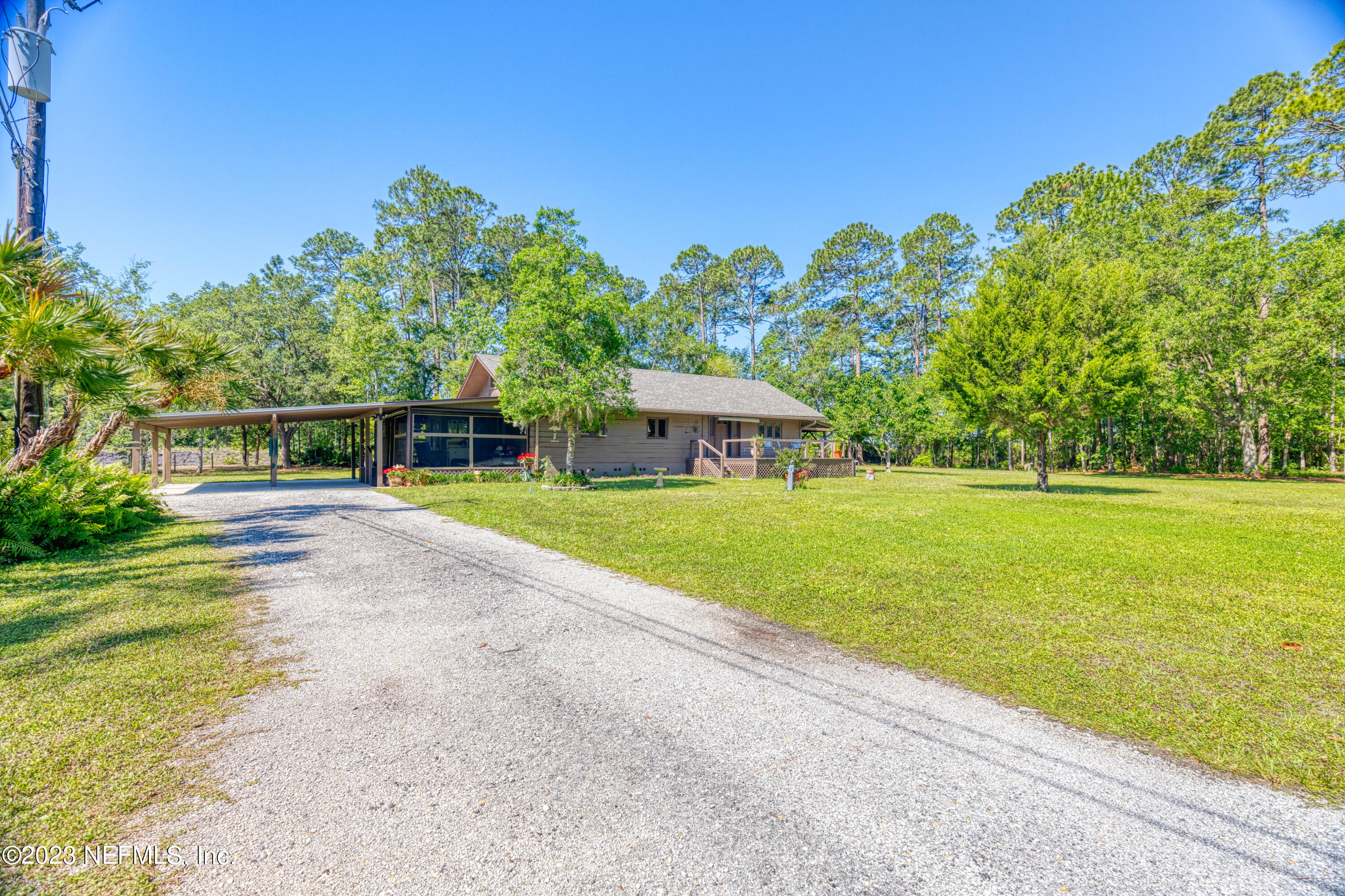 3075 Joe Ashton Road St. Augustine, FL 32092 - Photo 6 of 50 Drive leads you to this amazing cabin