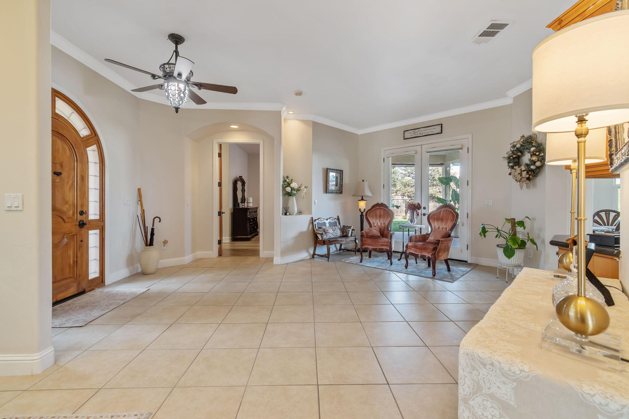 729 St Thomas Court Exeter, CA 93221 - Photo 8 of 66 a view of a livingroom with furniture and a chandelier