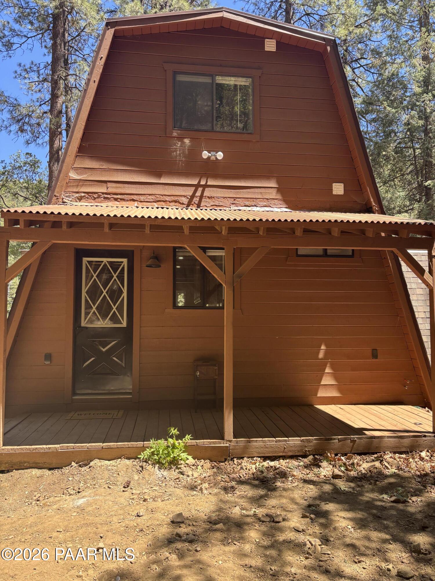 8550 South Breezy Pine Road Mayer, AZ 86333 - Photo 9 of 40 a front view of a house