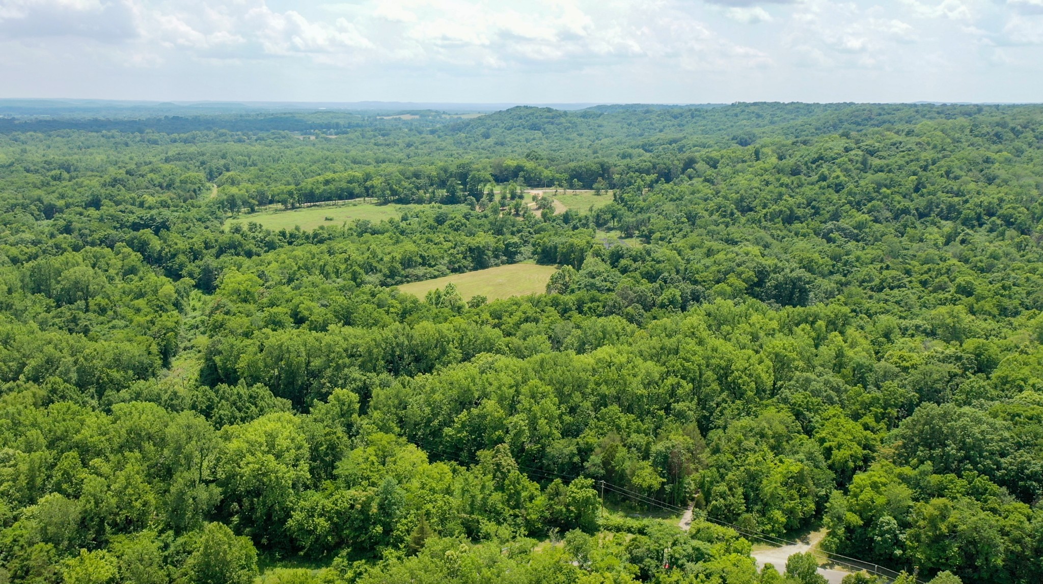 0 Parsons Bend Road Columbia, TN 38401 - Photo 19 of 34 an aerial view of houses covered in trees