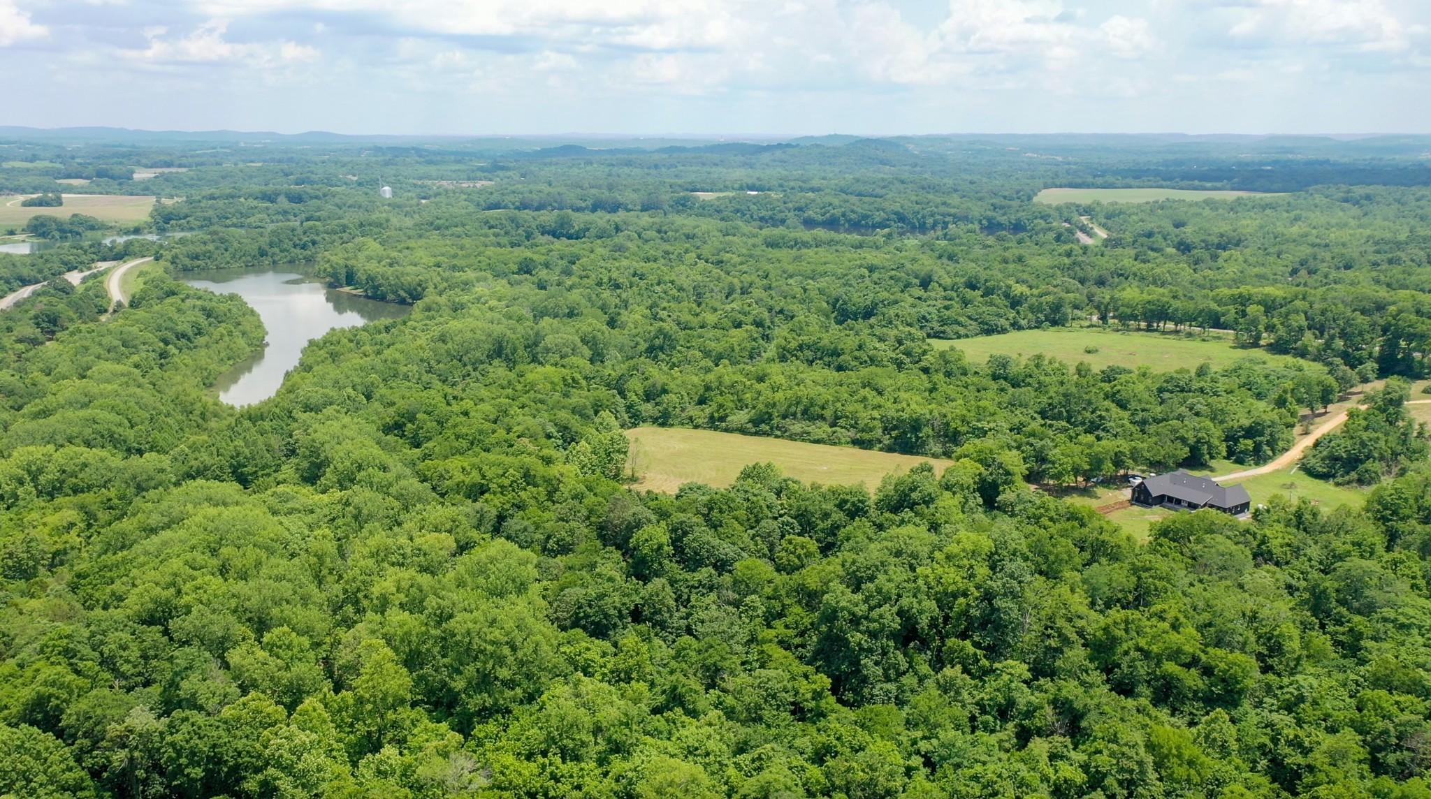 0 Parsons Bend Road Columbia, TN 38401 - Photo 24 of 34 a view of a lush green forest with lots of trees