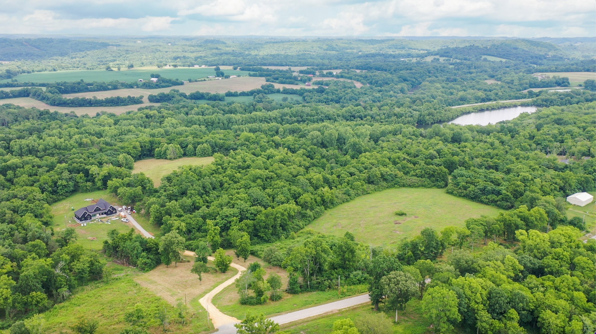 0 Parsons Bend Road Columbia, TN 38401 - Photo 33 of 34 an aerial view of a house with a yard and lake view