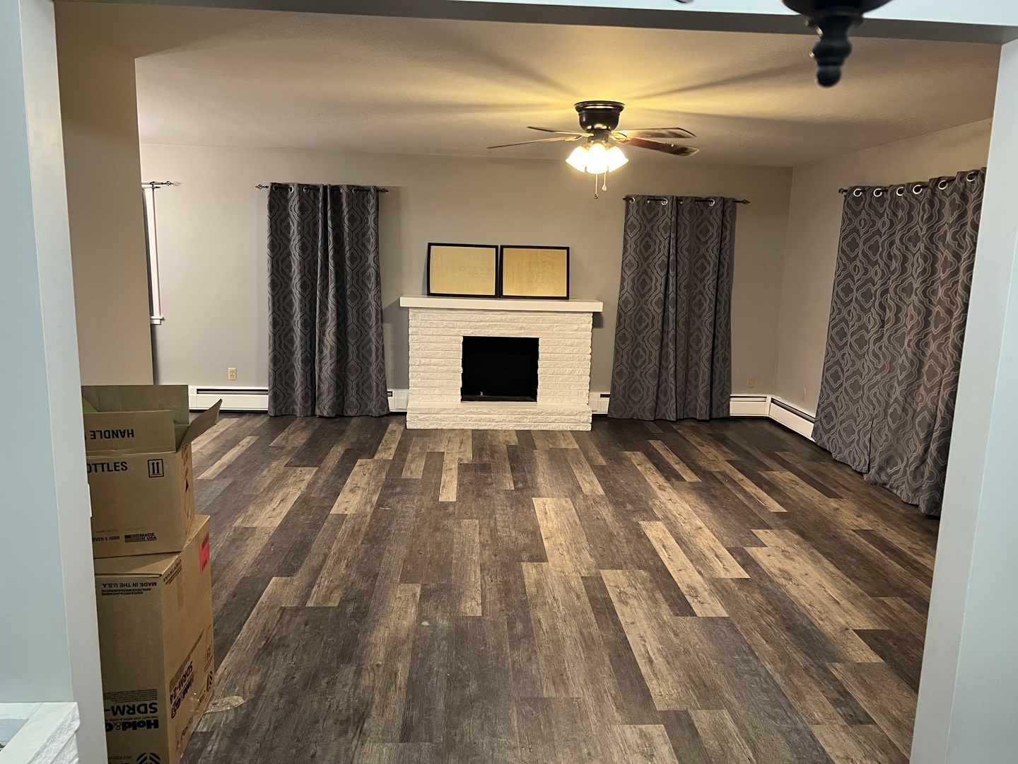 125 West Exchange Street Danvers, IL 61732 - Photo 11 of 66 a view of a livingroom with a fireplace