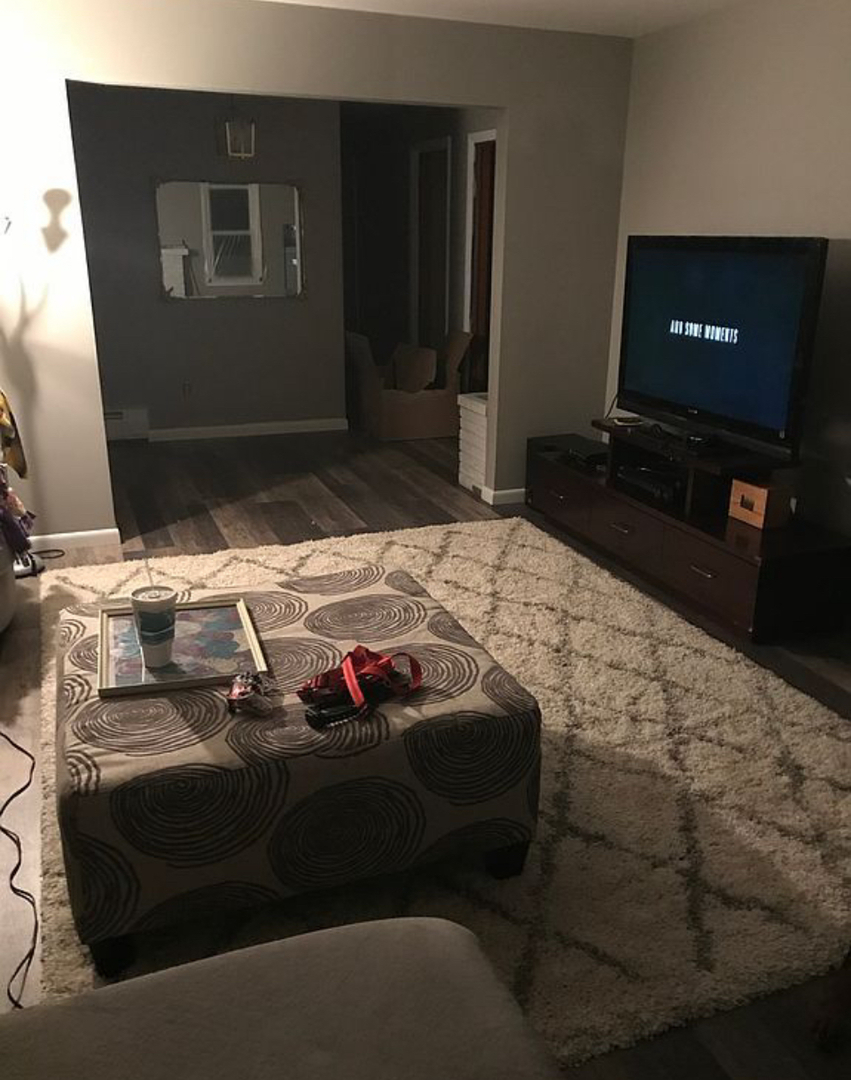 125 West Exchange Street Danvers, IL 61732 - Photo 12 of 66 a bedroom with a bed and a television