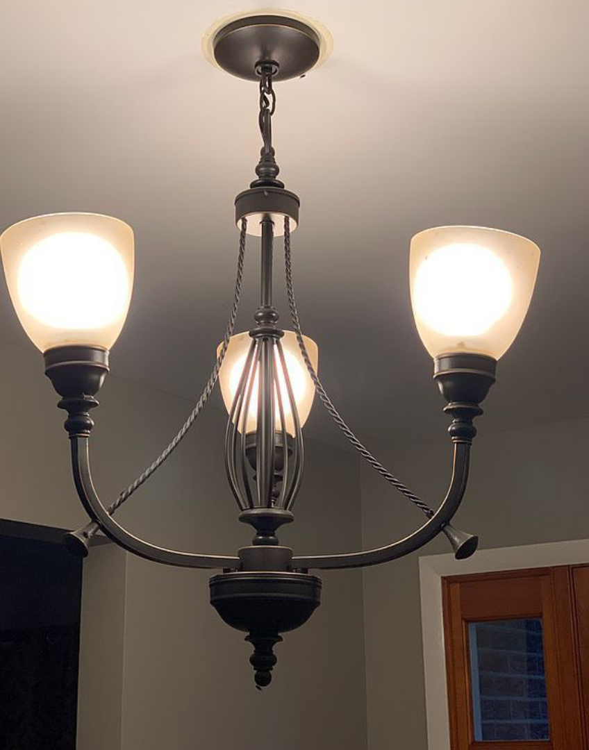 125 West Exchange Street Danvers, IL 61732 - Photo 15 of 66 a room with a chandelier fan
