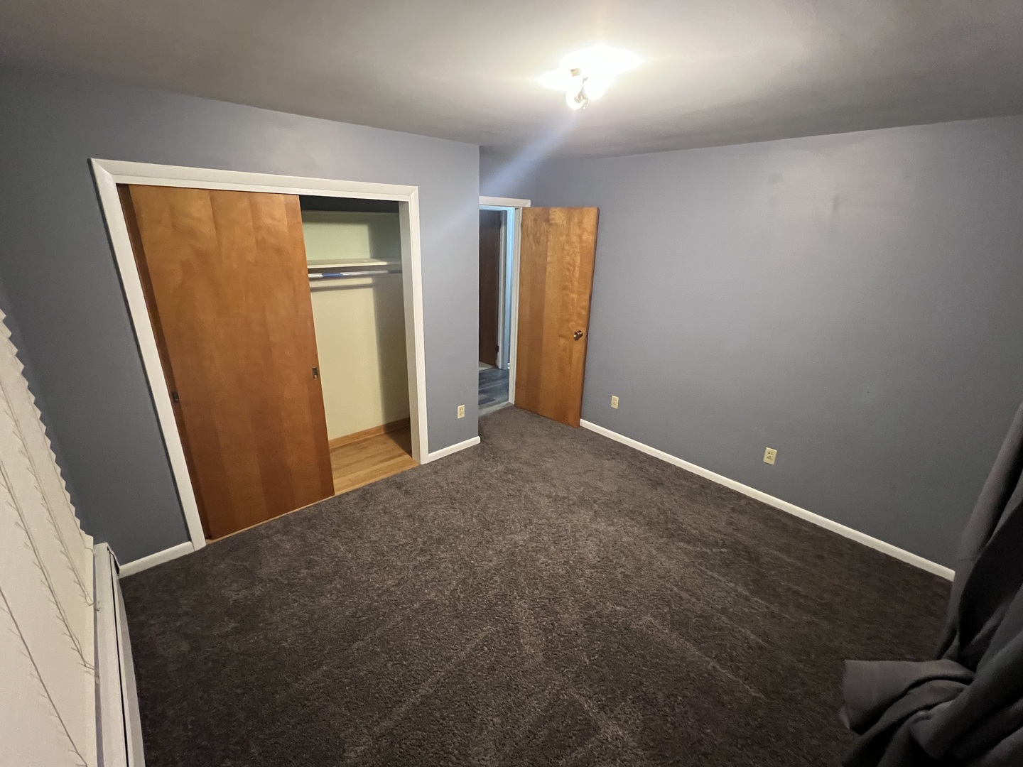 125 West Exchange Street Danvers, IL 61732 - Photo 20 of 66 an empty room with windows
