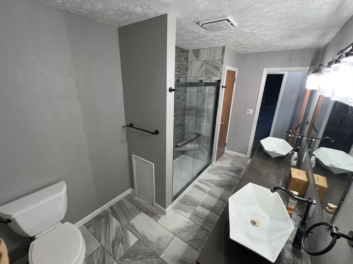 125 West Exchange Street Danvers, IL 61732 - Photo 22 of 66 a bathroom with a toilet and a shower