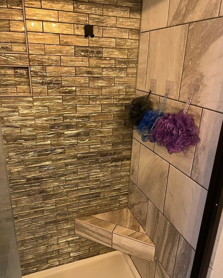 125 West Exchange Street Danvers, IL 61732 - Photo 25 of 66 a bathroom with a shower