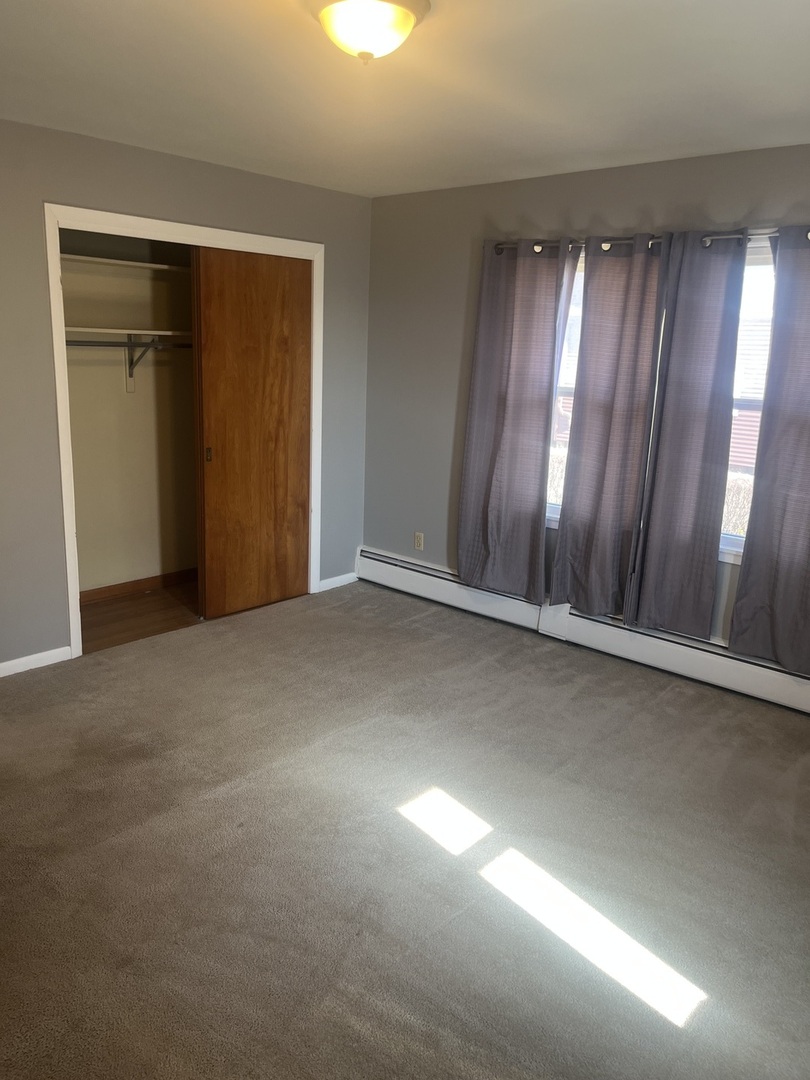 125 West Exchange Street Danvers, IL 61732 - Photo 30 of 66 a view of an empty room and window
